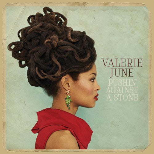 the album cover for Valerie June - Pushin Against a Stone