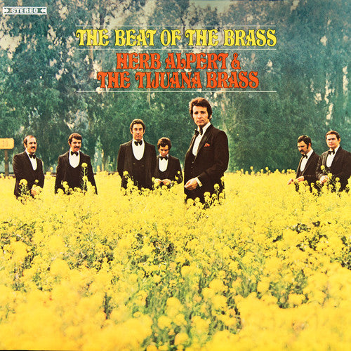 the album cover for Herb Alpert & Tijuana Brass - The Beat Of The Brass