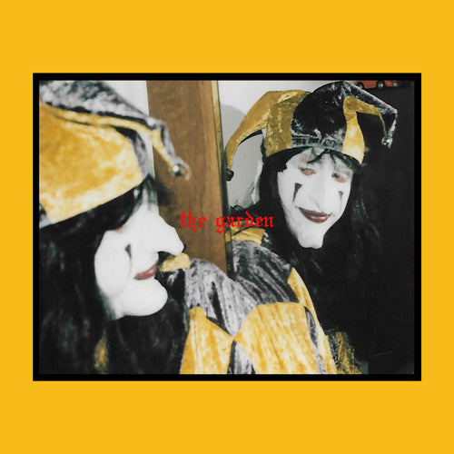 the album cover for The Garden - Mirror Might Steal Your Charm