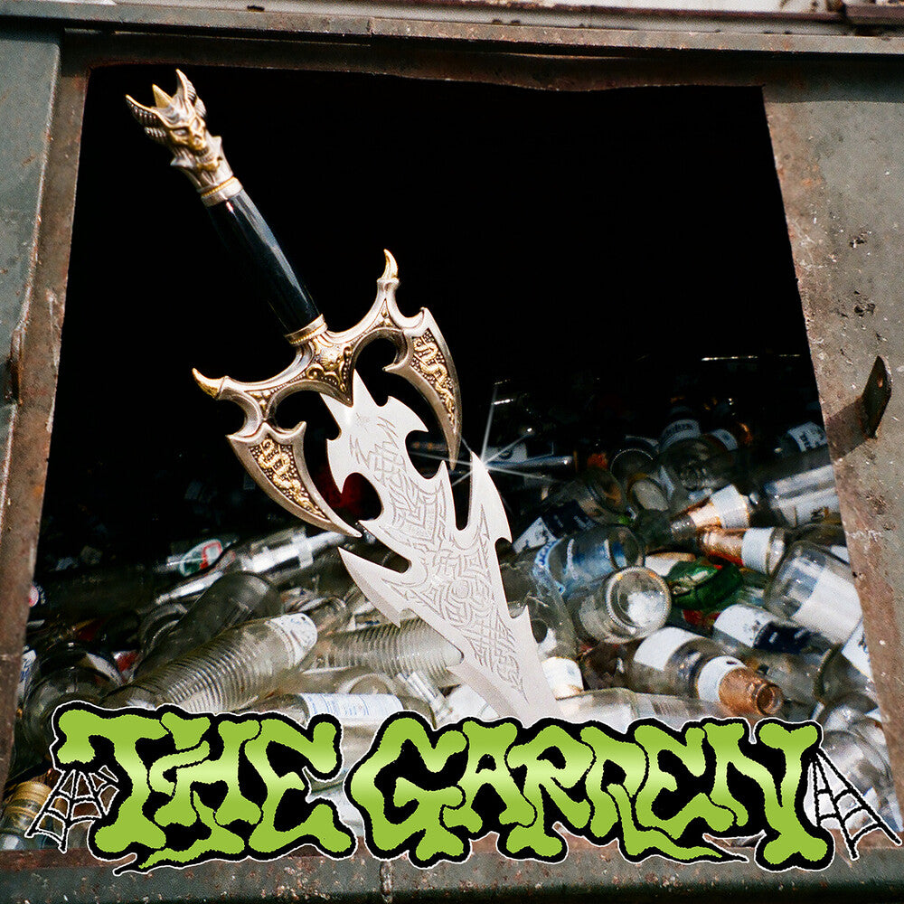 the album cover for The Garden - Kiss My Super Bowl Ring