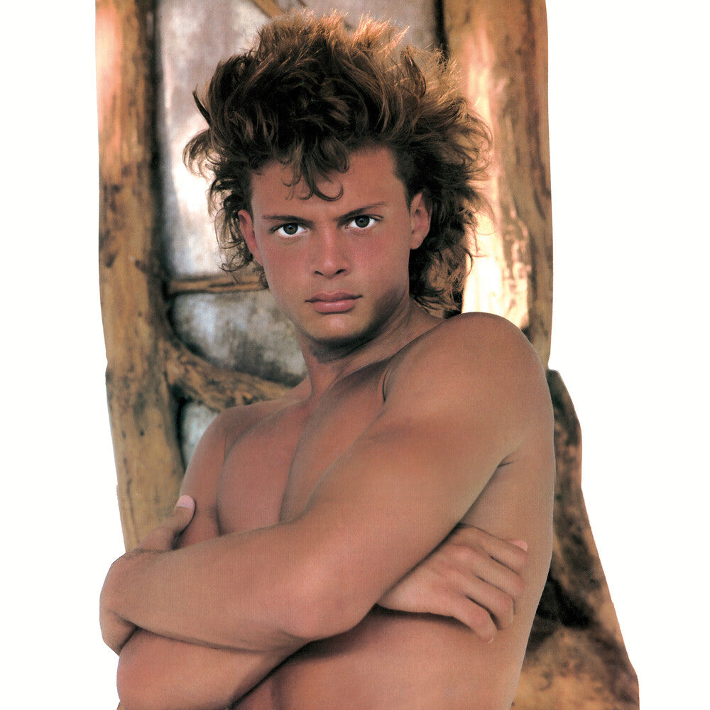 the album cover for Luis Miguel - Busca Una Mujer