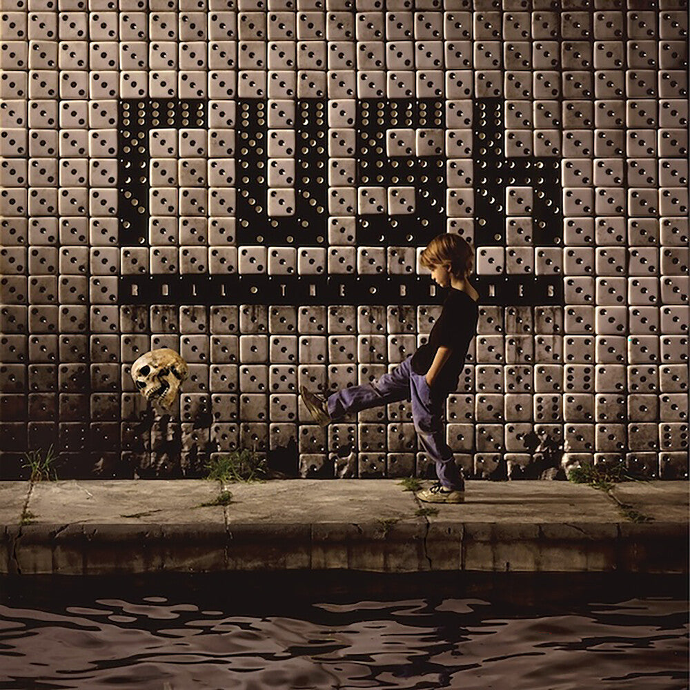 the album cover for Rush - Roll The Bones (Bme)