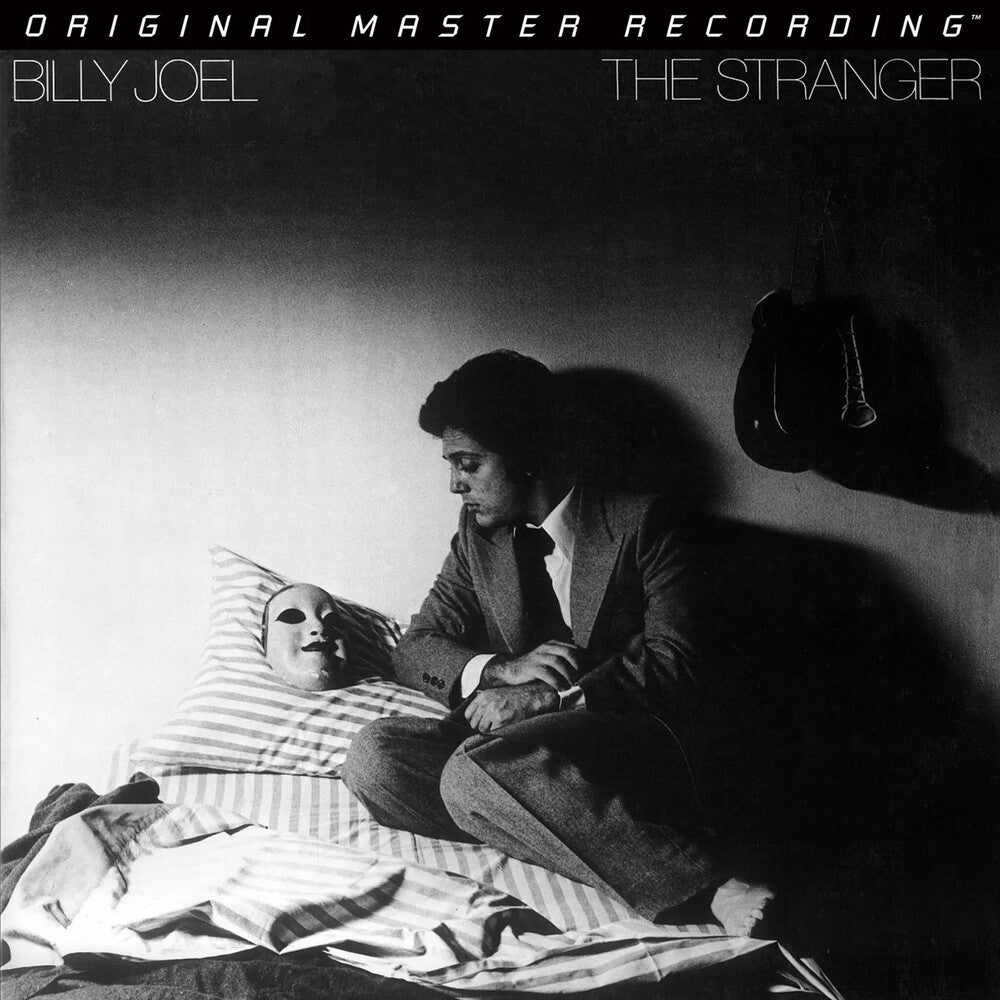 the album cover for Billy Joel - The Stranger