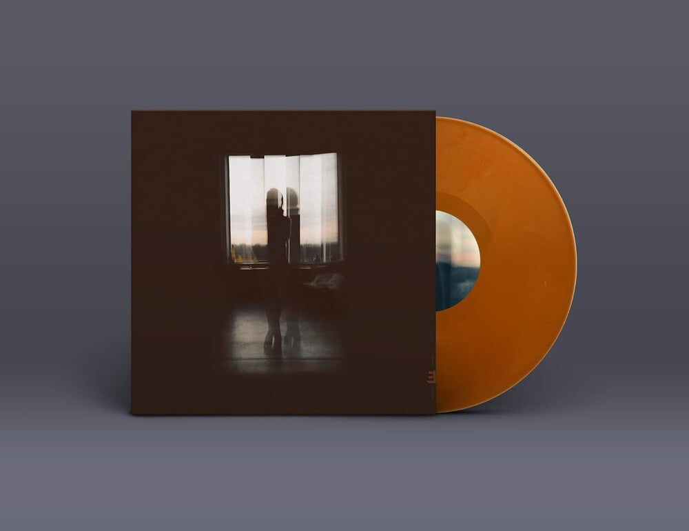 the album cover for Hazama, Miho - Frames - Textured Gold Vinyl