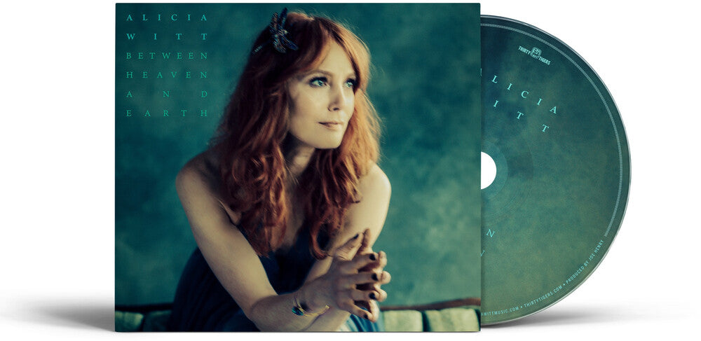 the album cover for Alicia Witt - Between Heaven and Earth