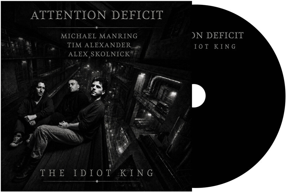 the album cover for Attention Deficit - The Idiot King
