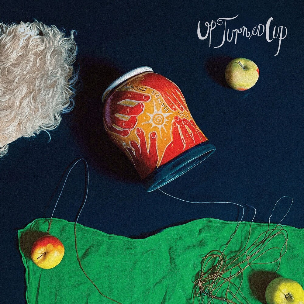 the album cover for Hands Free - Upturned Cup
