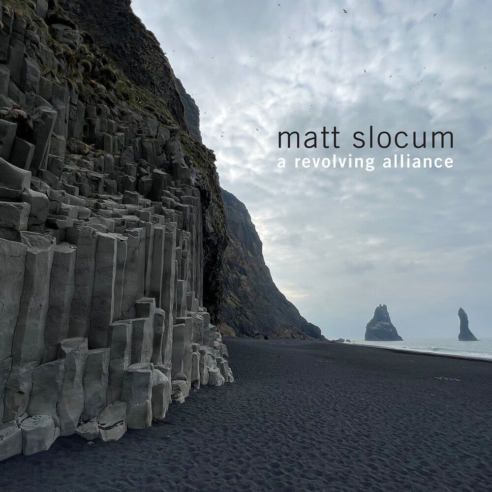 the album cover for Matt Slocum - Revolving Alliance