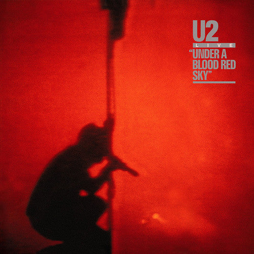 the album cover for U2 - Under a Blood Red Sky: Remastered [LP]