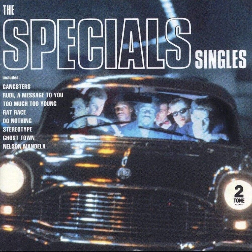 the album cover for The Specials - The Singles [Import LP]