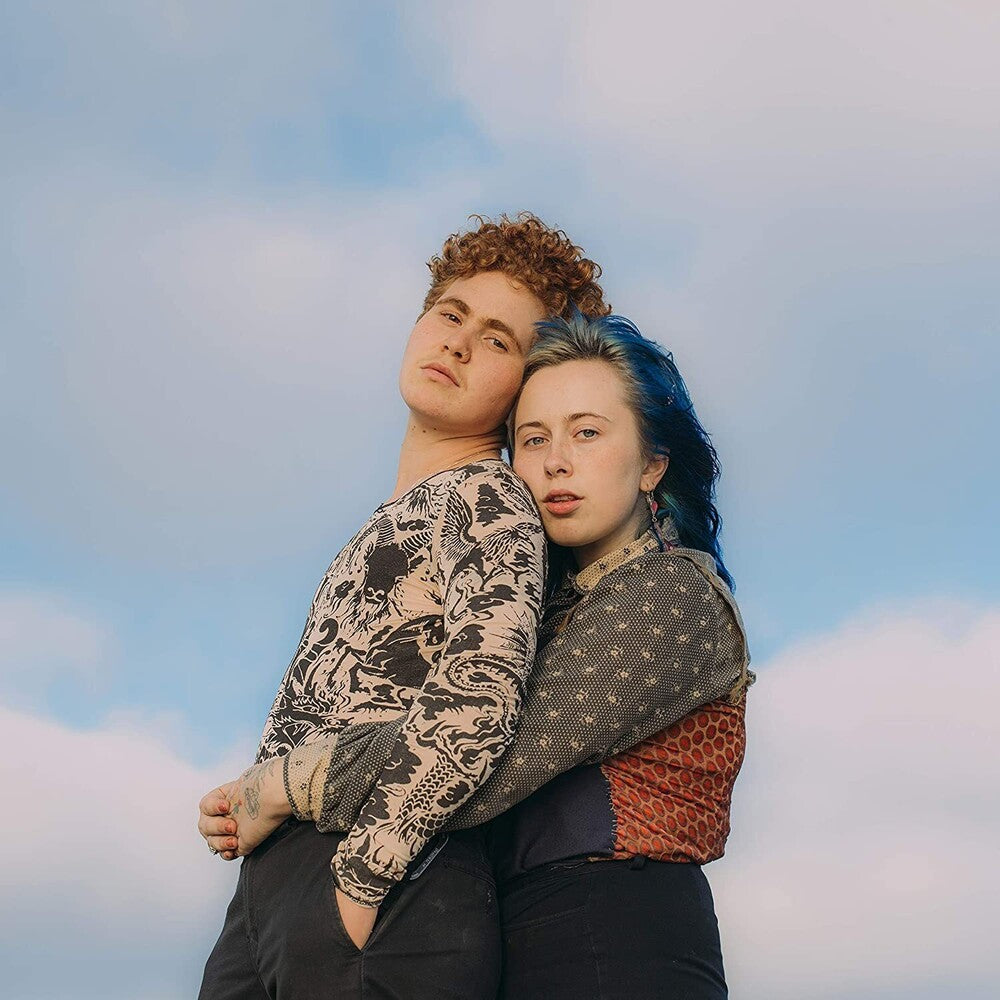 the album cover for Girlpool - What Chaos Is Imaginary (Coke Bottle Clr) [Colored Vinyl]