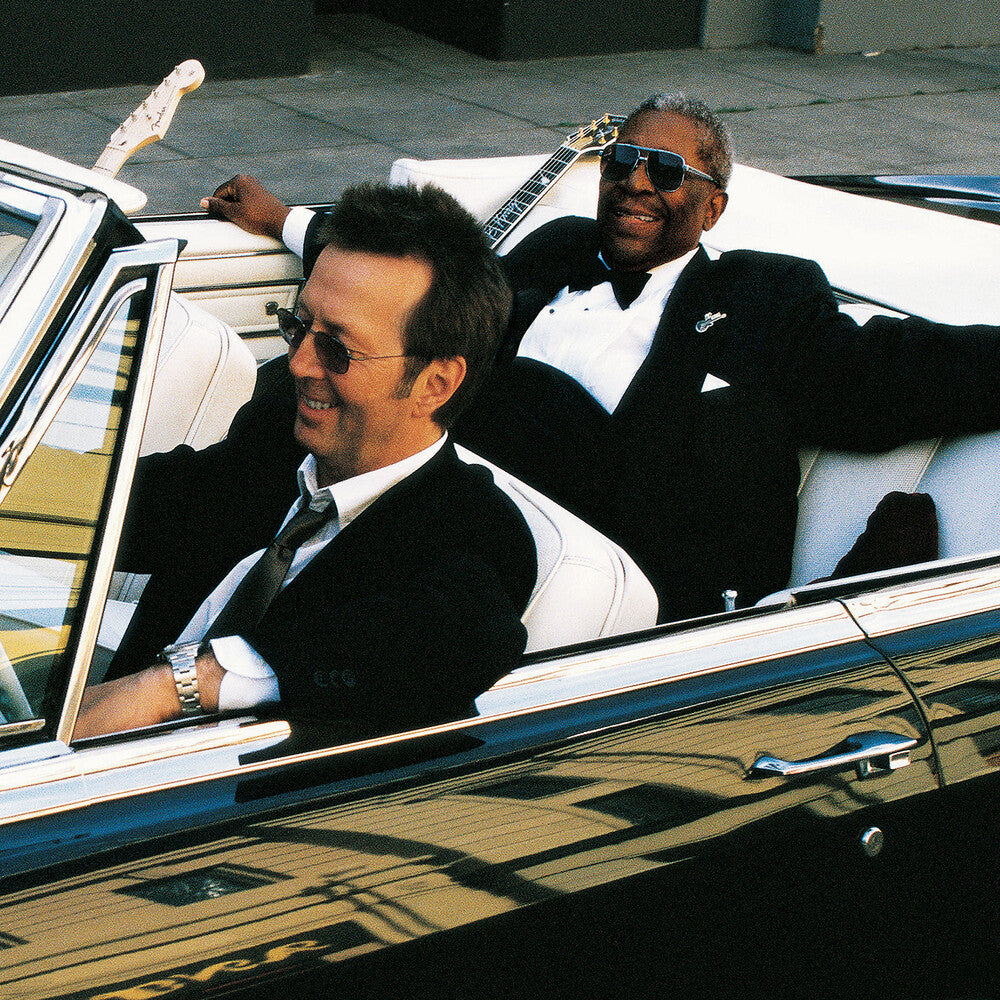 the album cover for Eric Clapton - Riding With The King: 20th Anniversary Edition [Indie Exclusive Limited Edition Blue 2LP]