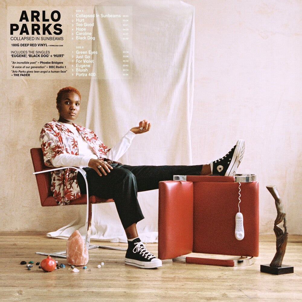 the album cover for Arlo Parks - Collapsed In Sunbeams [Deep Red LP]