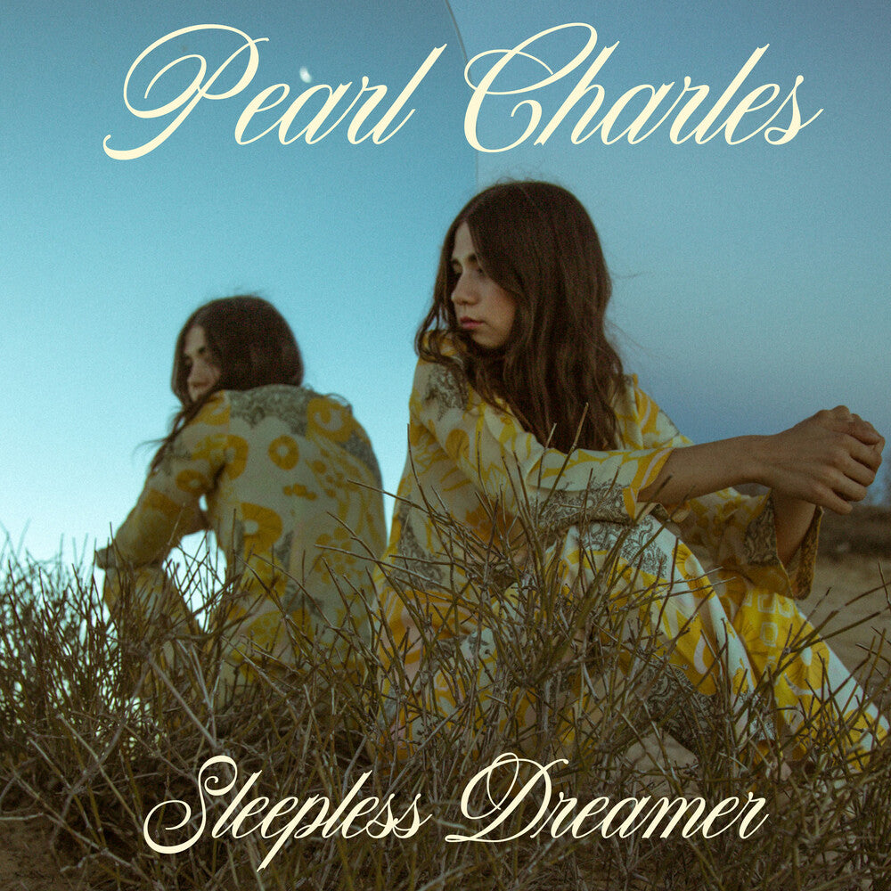 the album cover for Pearl Charles - Sleepless Dreamer (Pink Vinyl) [Colored Vinyl] (Pnk)