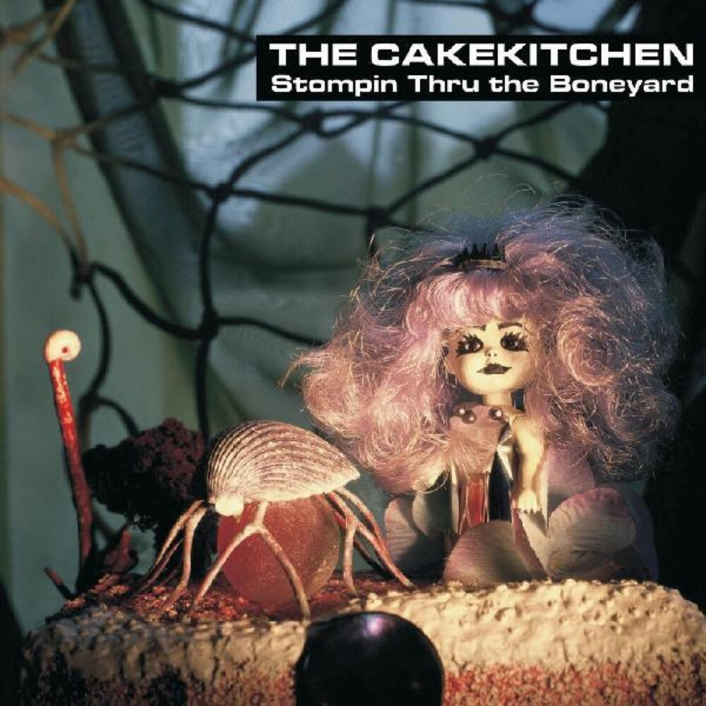 the album cover for Cakekitchen - Stompin Thru The Boneyard (Blk) [Colored Vinyl] (Ofgv)