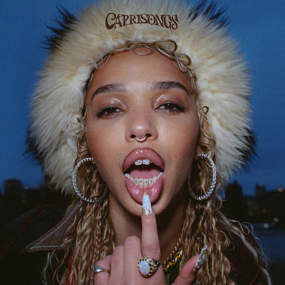 the album cover for FKA Twigs - CAPRISONGS [Glow In The Dark LP]