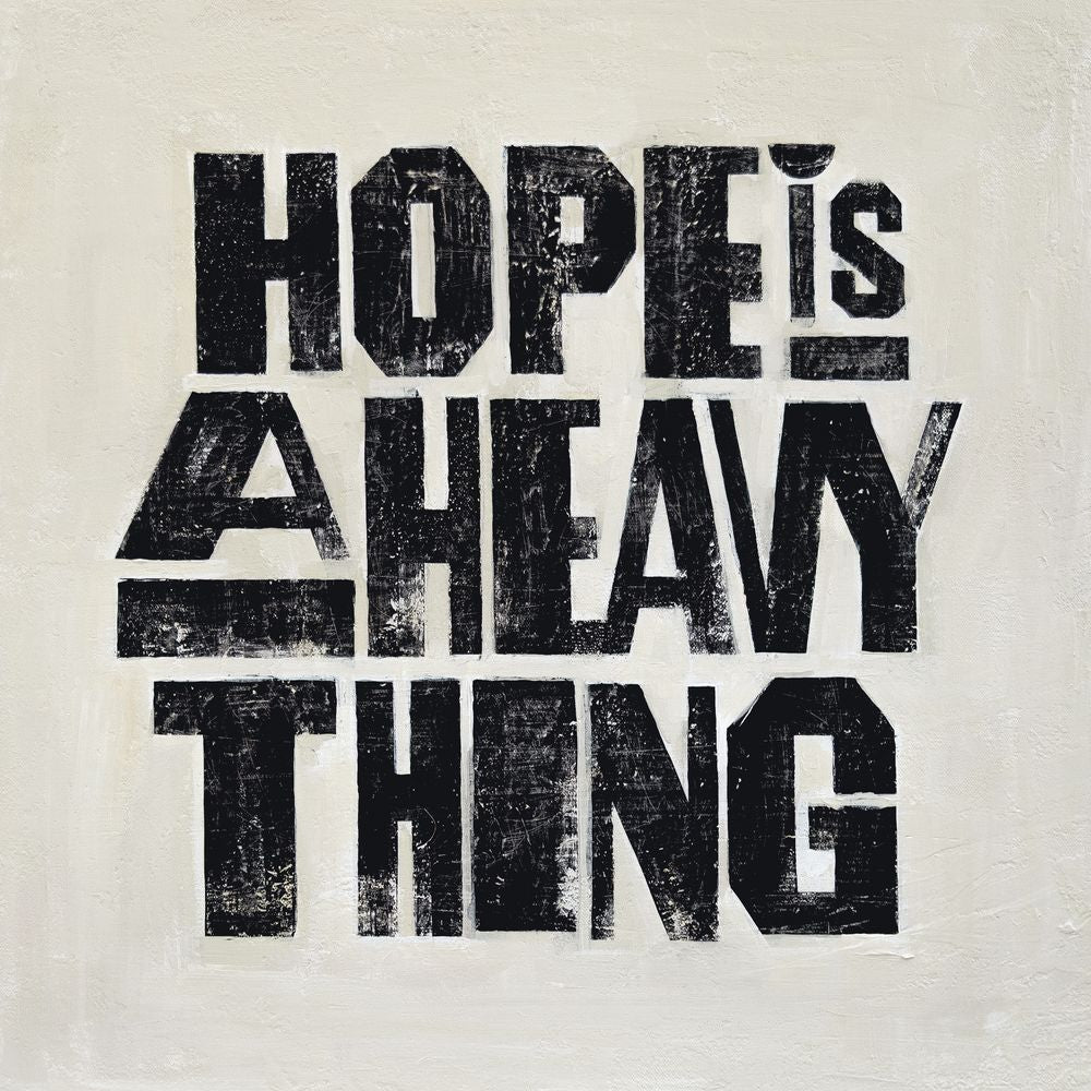 the album cover for Joy Oladokun - Hope Is A Heavy Thing [Indie Exclusive Eco-Friendly Gray Blend]