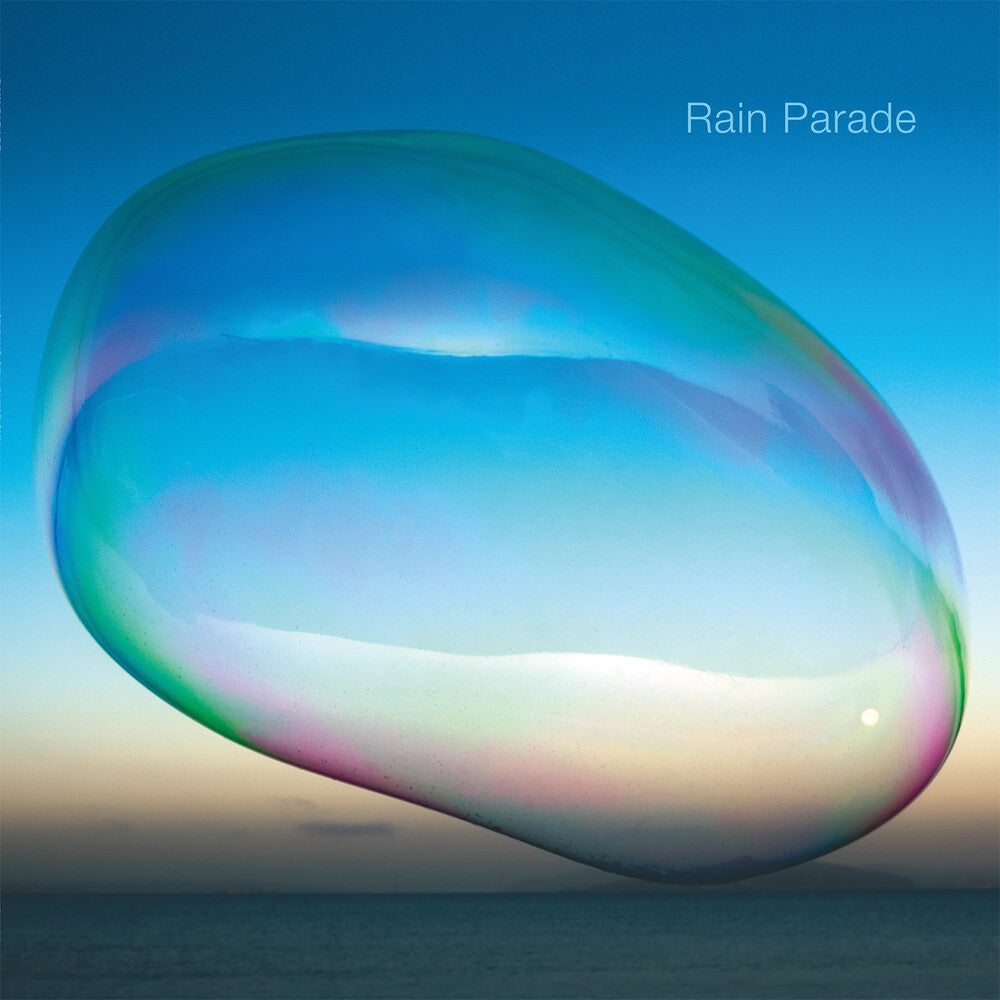 the album cover for Rain Parade - Last Rays Of A Dying Sun [Transparent Blue LP]