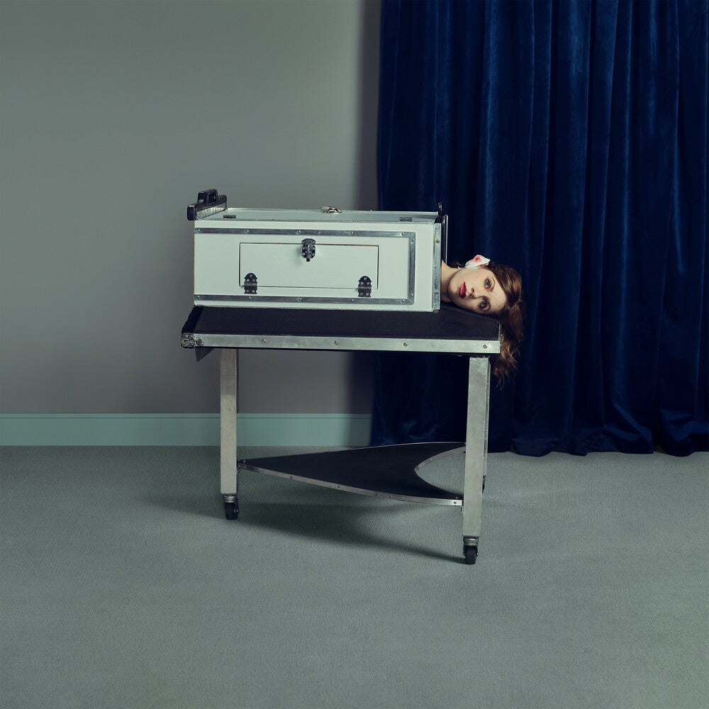 the album cover for K.Flay - MONO [Coke Bottle Clear LP]