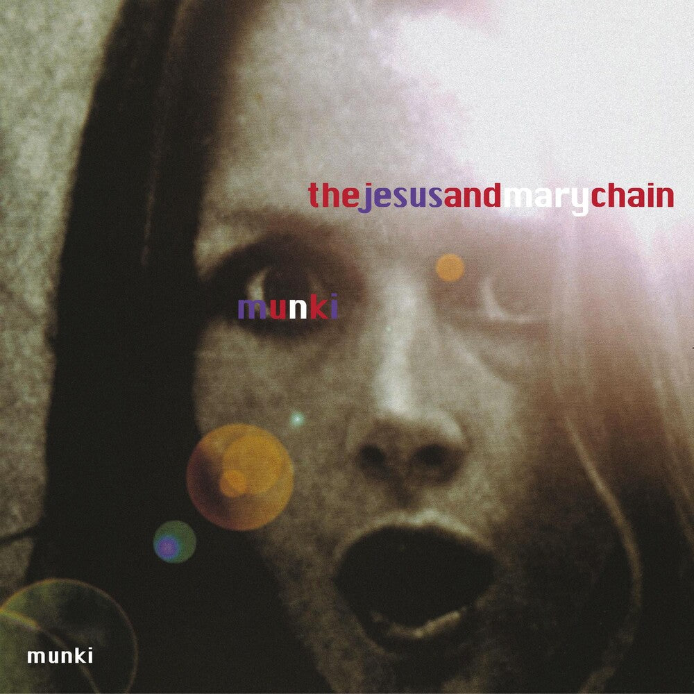 the album cover for The Jesus And Mary Chain - Munki: 25th Anniversary [Indie Exclusive Limited Edition Red/Blue 2LP]