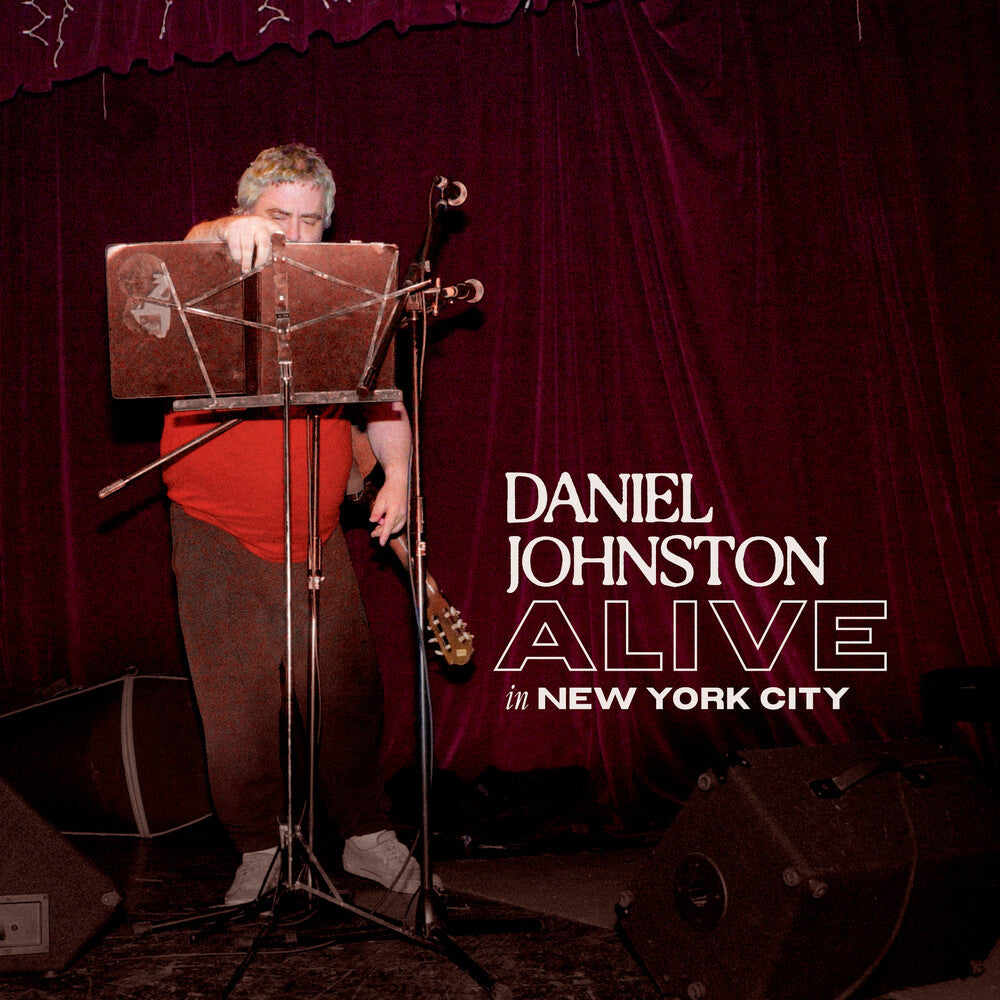 the album cover for Daniel Johnston - Alive In New York City [Clear Vinyl]