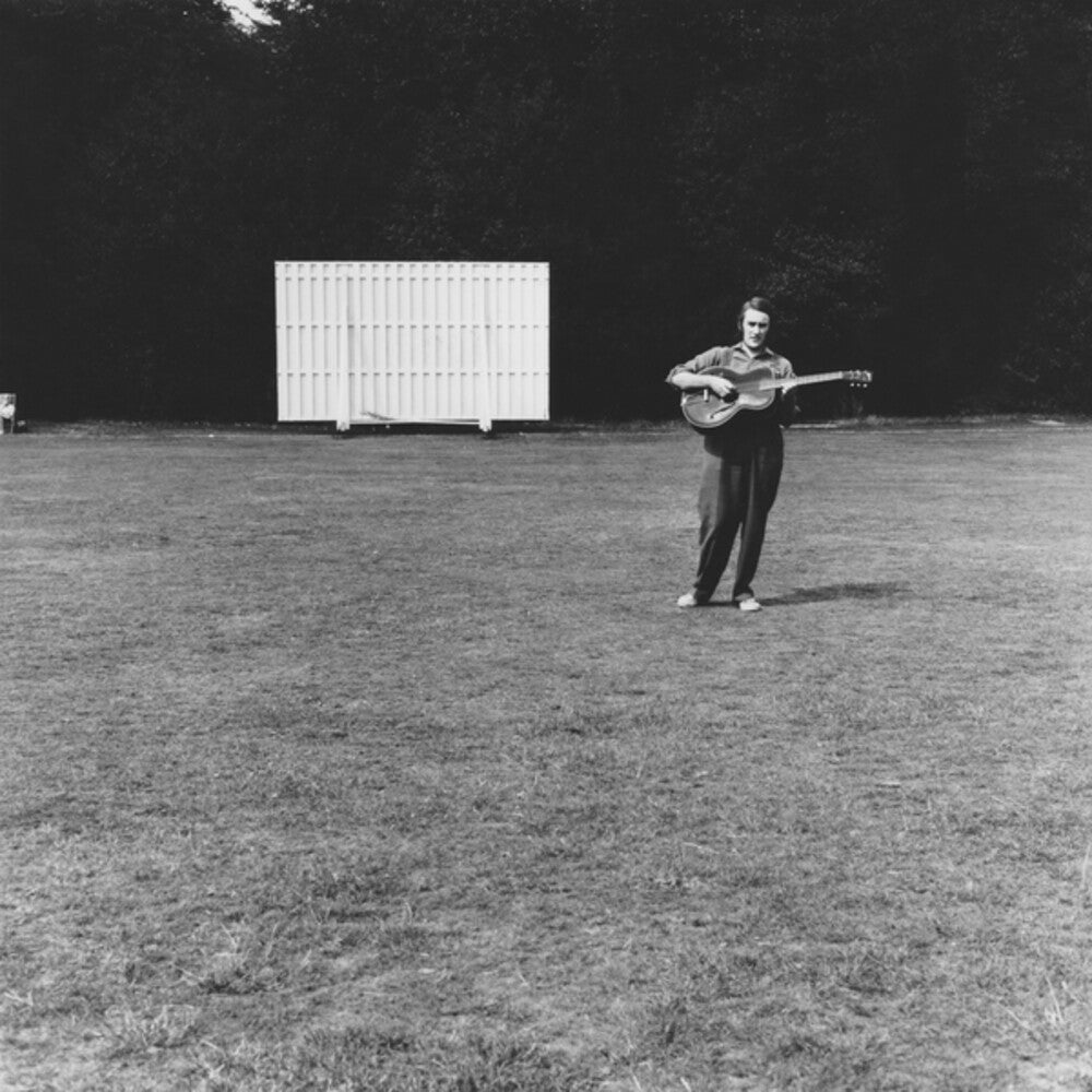 the album cover for Fred Frith - Guitar Solos / Fifty