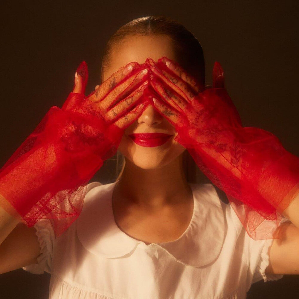 the album cover for Ariana Grande - eternal sunshine [Alt Cover, Ruby LP]