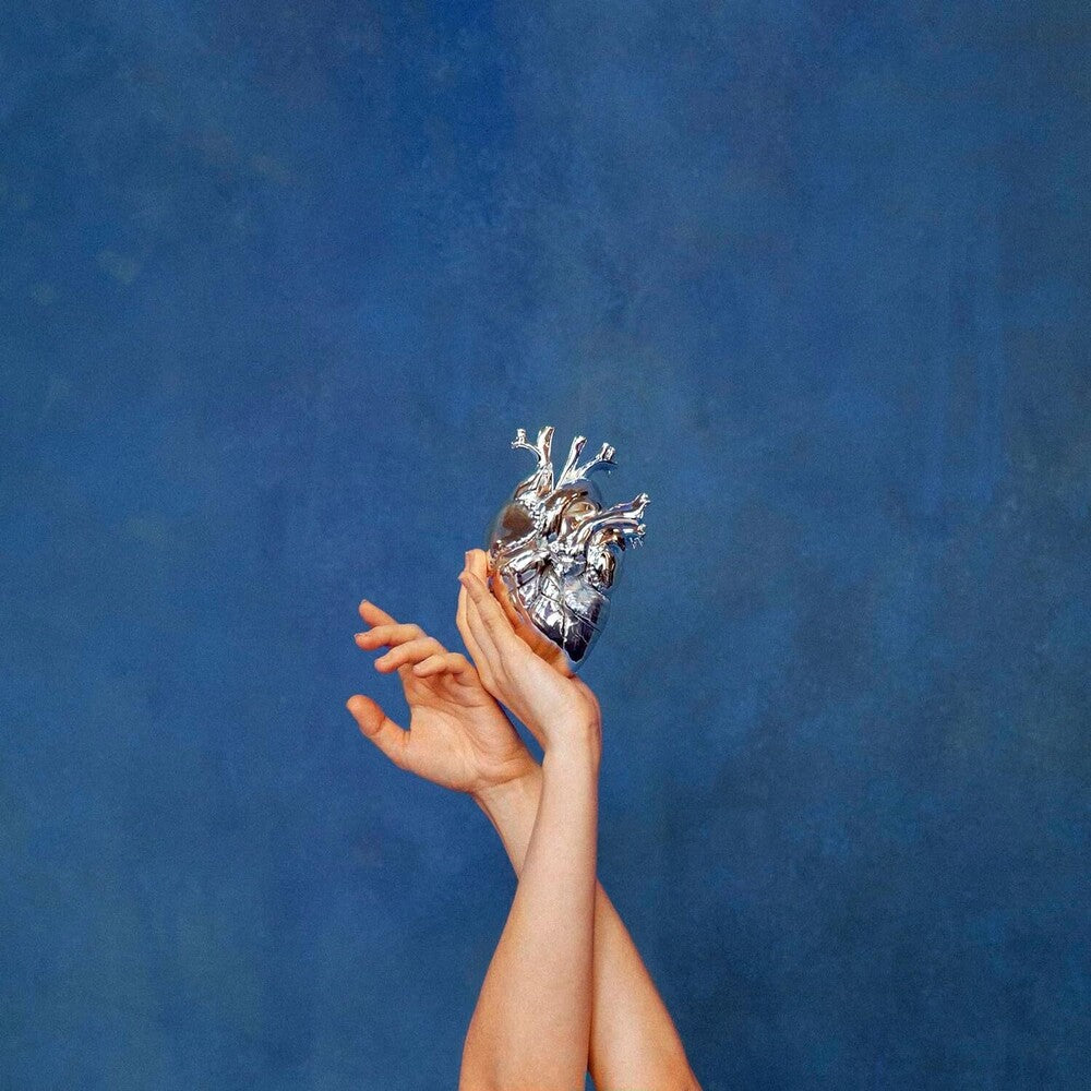 the album cover for Aurora -  What Happened To The Heart?