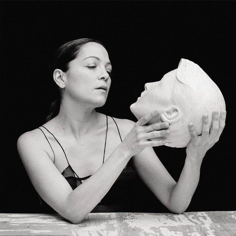 the album cover for Natalia Lafourcade - De Todas Las Flores