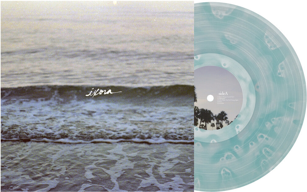 the album cover for Copeland - Ixora [Indie Exclusive] Clear & Light Blue Ghostly (Blue)