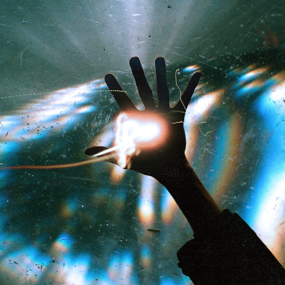 the album cover for Architects - The Sky, The Earth &amp; All Between