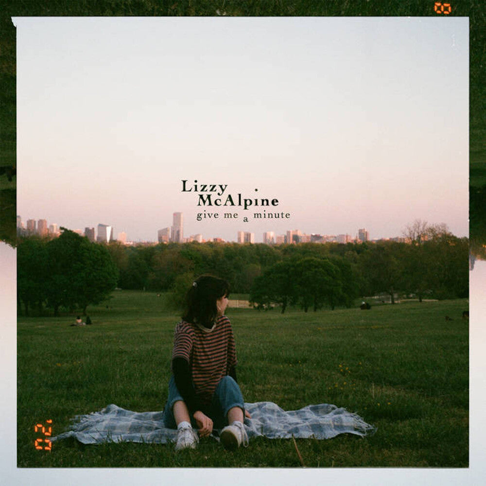 the album cover for Lizzy McAlpine - Give Me A Minute - Green [Colored Vinyl] (Grn)