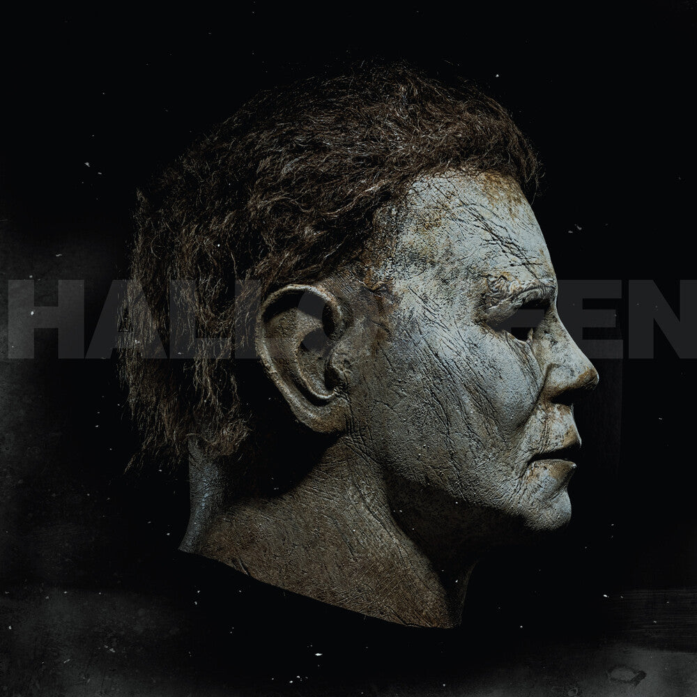 the album cover for John Carpenter - Halloween (Expanded Art Edition) - O.S.T. [Colored Vinyl]