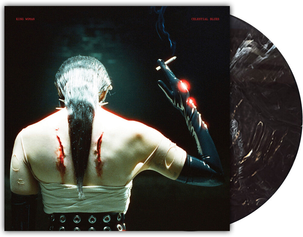 the album cover for King Woman - Celestial Blues [Black Onyx Marble]
