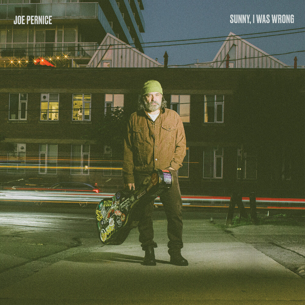 the album cover for Joe Pernice - Sunny, I Was Wrong [Autographed Indie Exclusive Blue and Black Splatter]