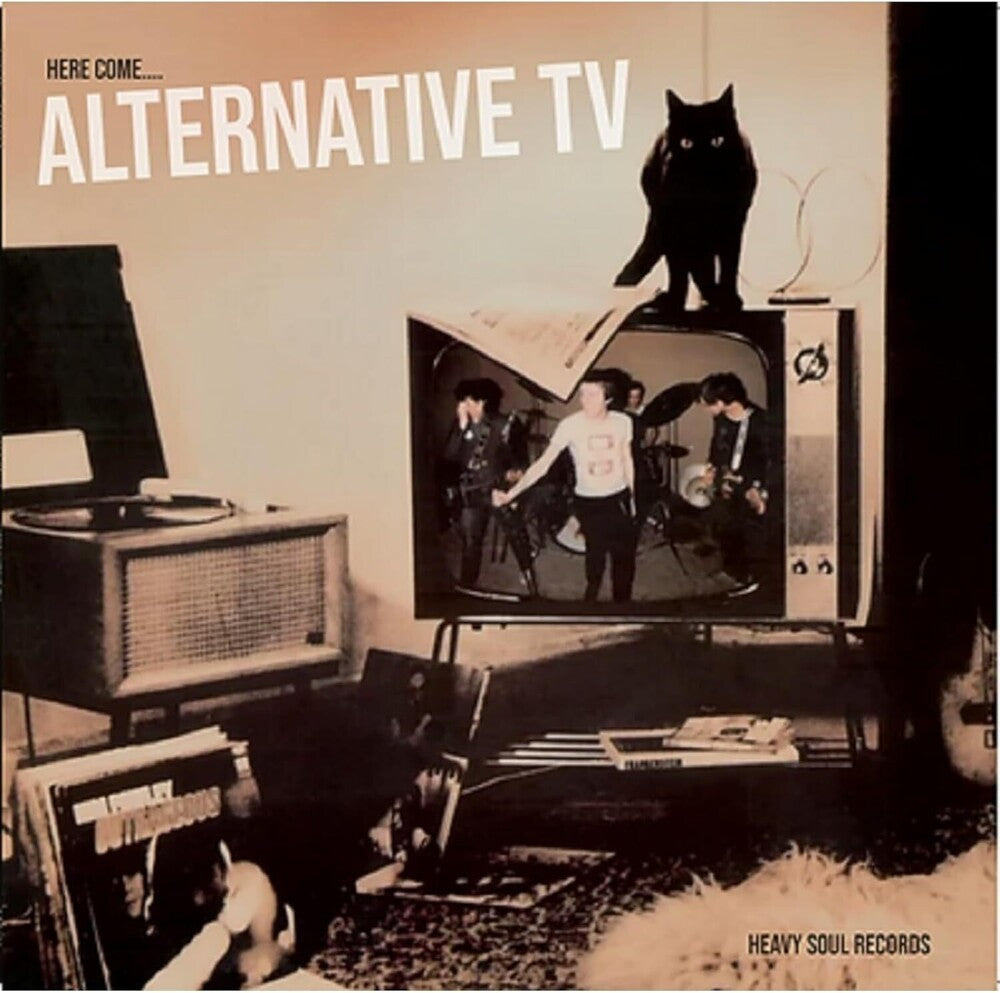 the album cover for Alternative Tv - Here Come... (Uk)