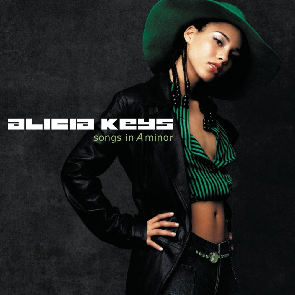 the album cover for Alicia Keys - Songs In A Minor - 25th Anniversary [Translucent Burnt Orange Marbled]