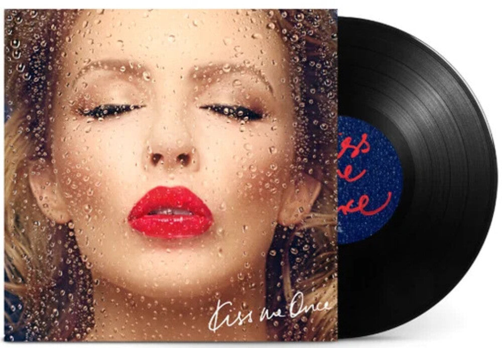 the album cover for Kylie Minogue - Kiss Me Once