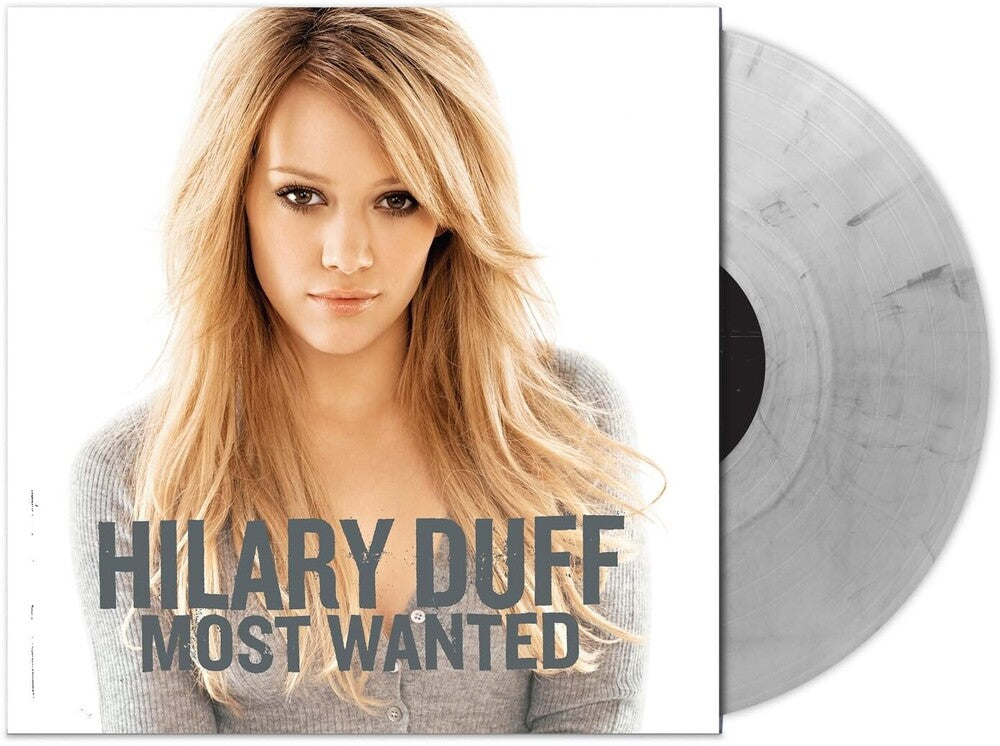 the album cover for Hilary Duff - Most Wanted [Metallic Silver/Black]