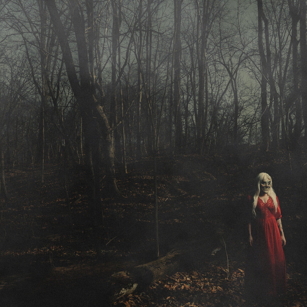 the album cover for 156/Silence - From A Distance [Indie Exclusive Blood Red / Evergreen w/ White Splatter]