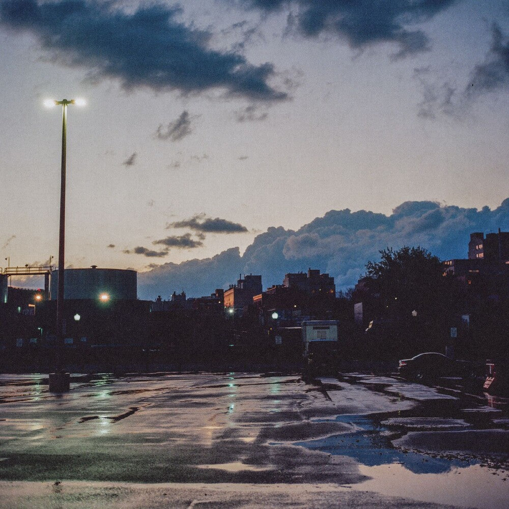 the album cover for Wild Pink - Still Coming Down [Midnight Blue]
