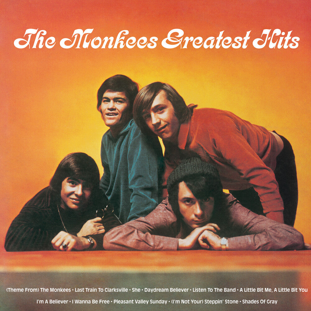 the album cover for Monkees - Greatest Hits (yellow Flame W/ Sticker Pack) (brick & Mortar Exclusive)