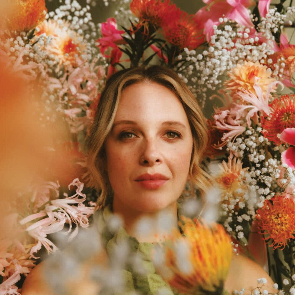 the album cover for Ruby Wood - No Rain. No Flowers