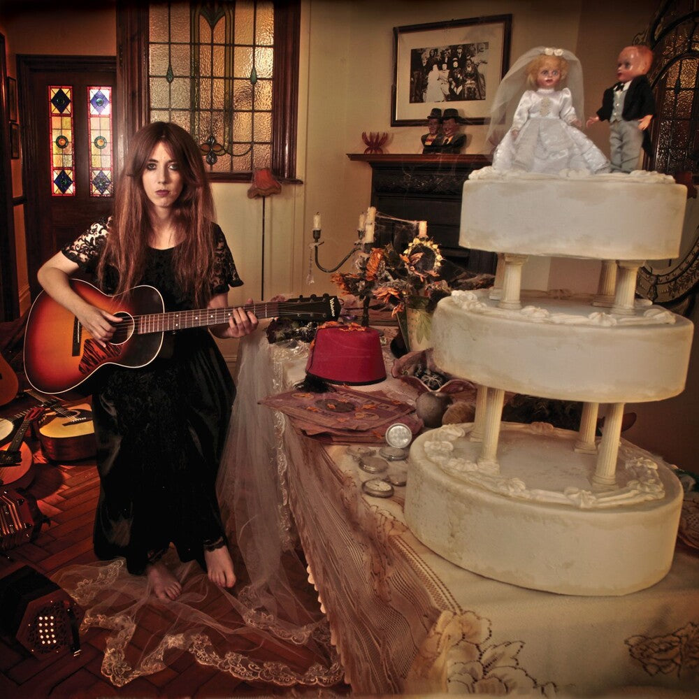 the album cover for Gwenifer Raymond - Strange Light Over Garth Mountain