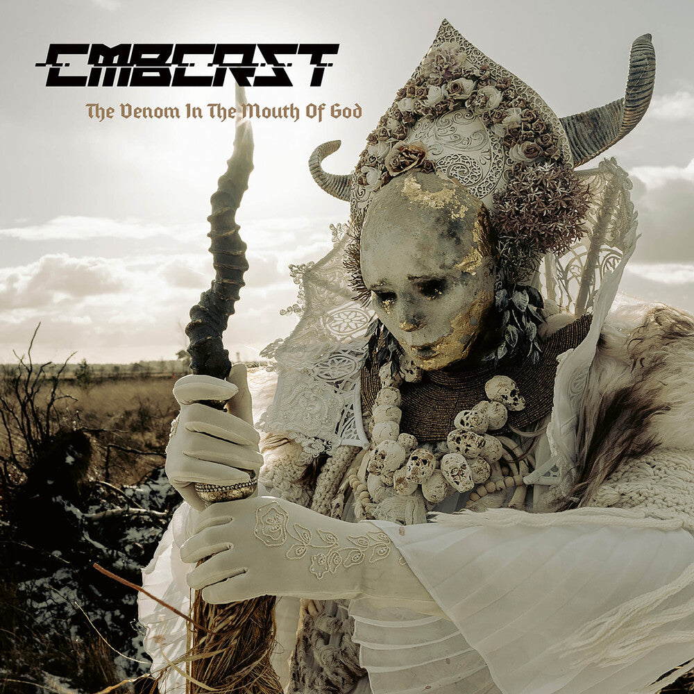 the album cover for Combichrist - The Venom in the Mouth of God