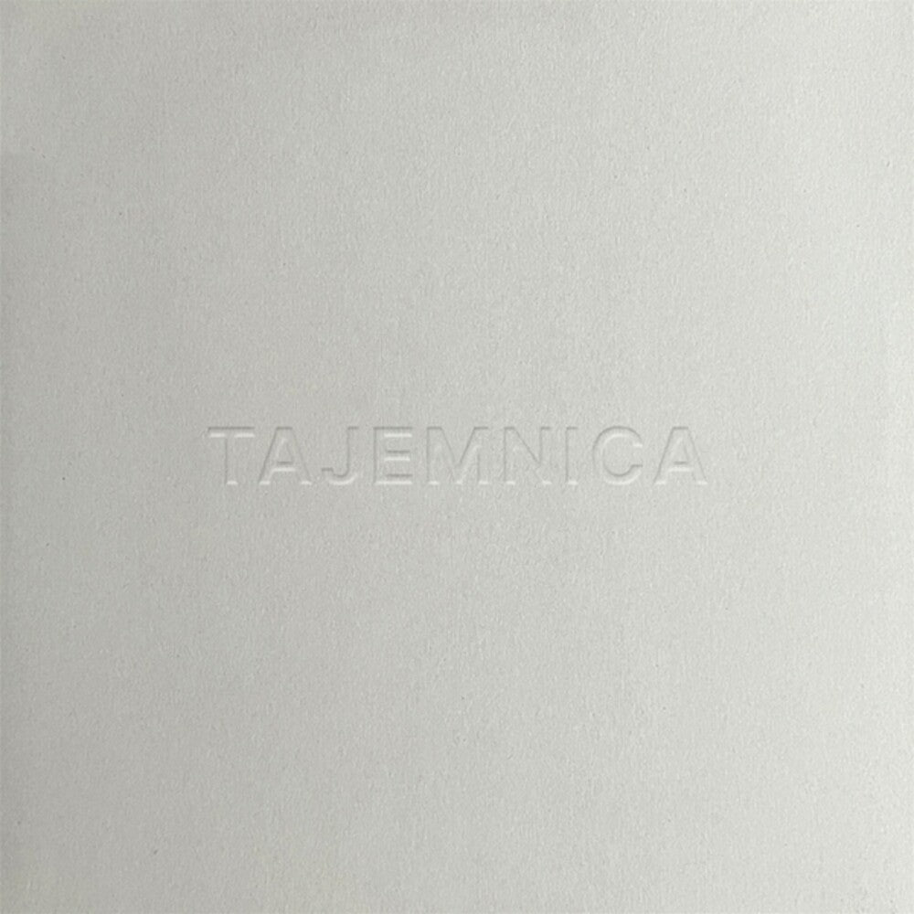 the album cover for Spalarnia - Tajemnica