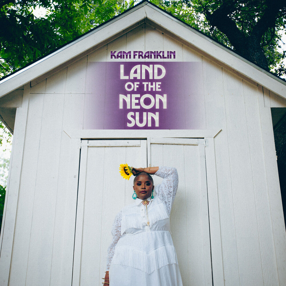 the album cover for Kam Franklin - Land of the Neon Sun