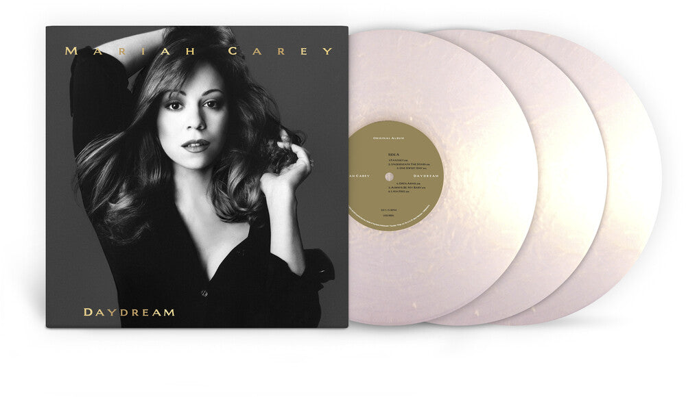 the album cover for Mariah Carey - Daydream - 30th Anniversary [Iridescent Gold]