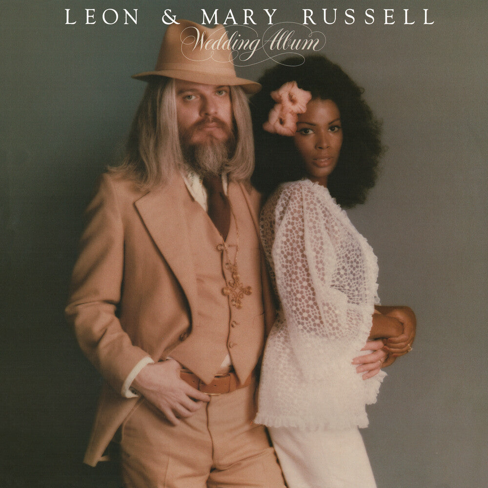 the album cover for Leon Russell - Wedding Album [Colored Vinyl] (Slv) (Aniv)